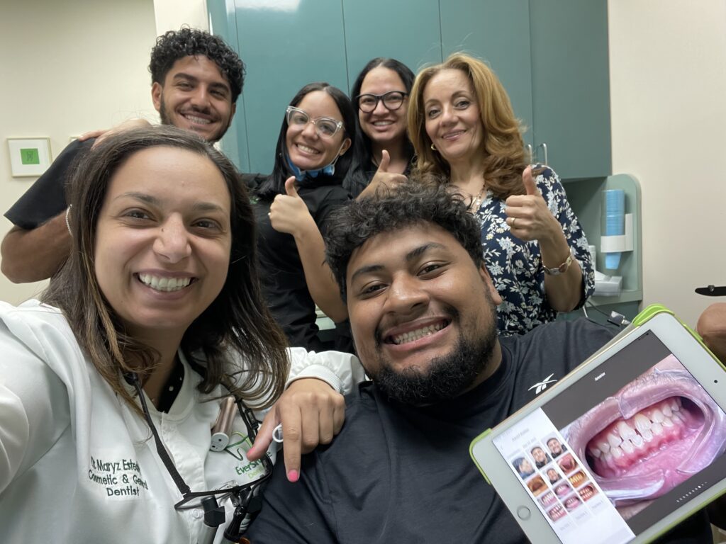 DR. MARYZ ESTEDRAK AND EVERSMILE DENTAL TEAM CELEBRATING PATIENT SMILE RESULTS - EVERSMILE DENTAL NJ