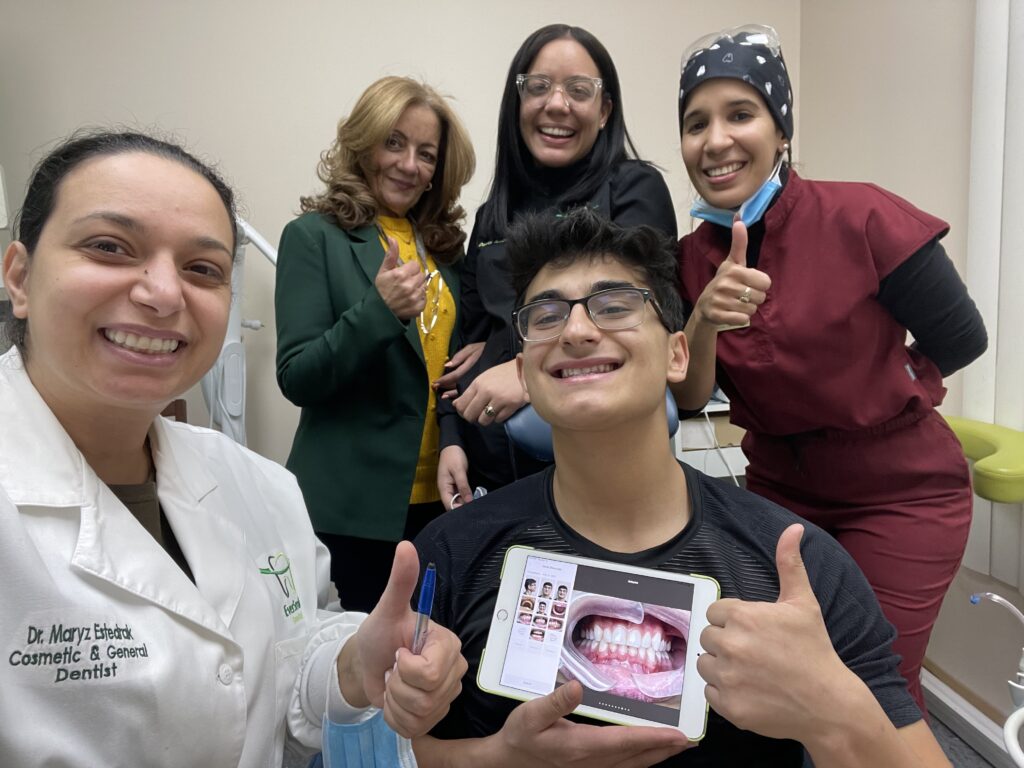 DR. MARYZ ESTEDRAK AND EVERSMILE DENTAL TEAM CELEBRATING PATIENT SMILE RESULTS - EVERSMILE DENTAL NJ
