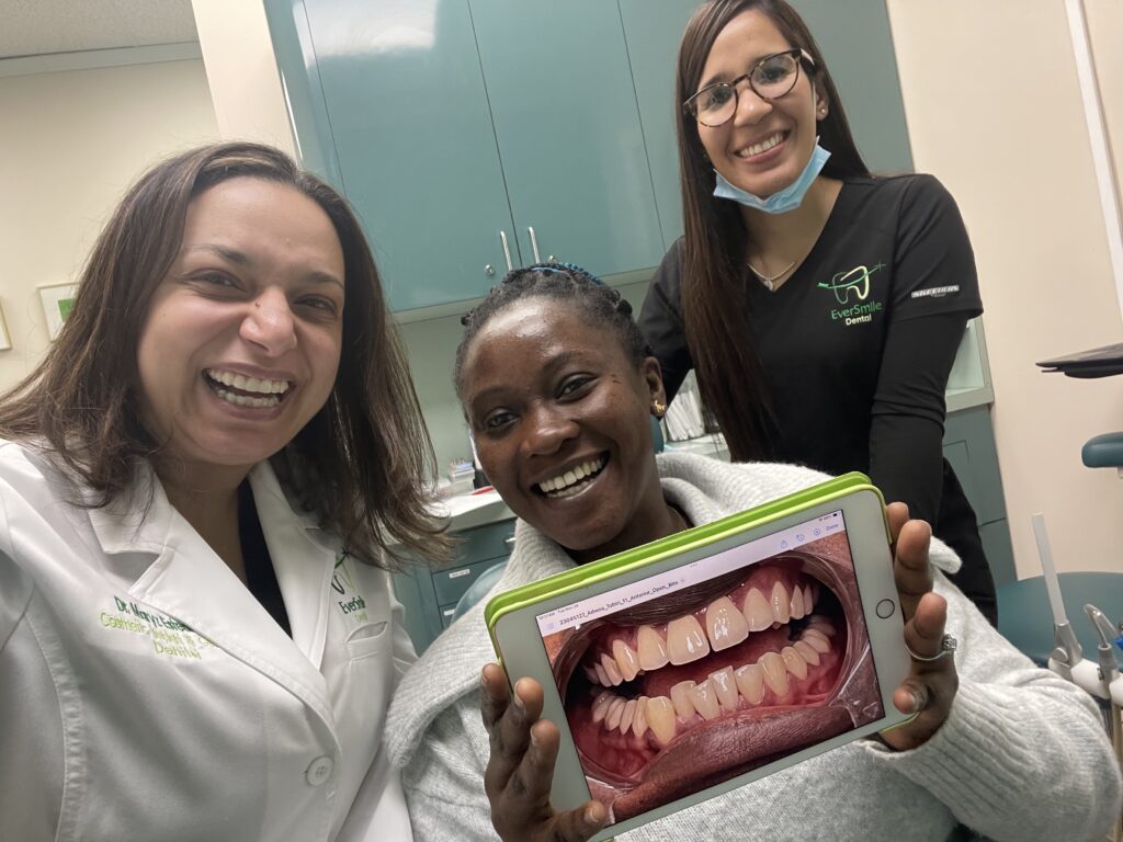 DR. MARYZ ESTEDRAK AND EVERSMILE DENTAL TEAM CELEBRATING PATIENT SMILE RESULTS - EVERSMILE DENTAL NJ