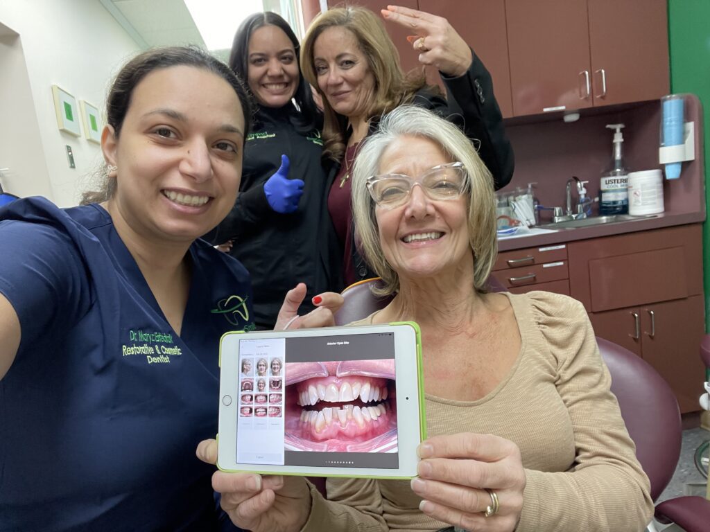 DR. MARYZ ESTEDRAK AND EVERSMILE DENTAL TEAM CELEBRATING PATIENT SMILE RESULTS - EVERSMILE DENTAL NJ