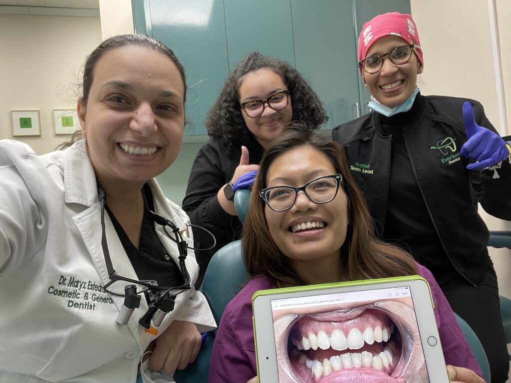 DR. MARYZ ESTEDRAK AND EVERSMILE DENTAL TEAM CELEBRATING PATIENT SMILE RESULTS - EVERSMILE DENTAL NJ