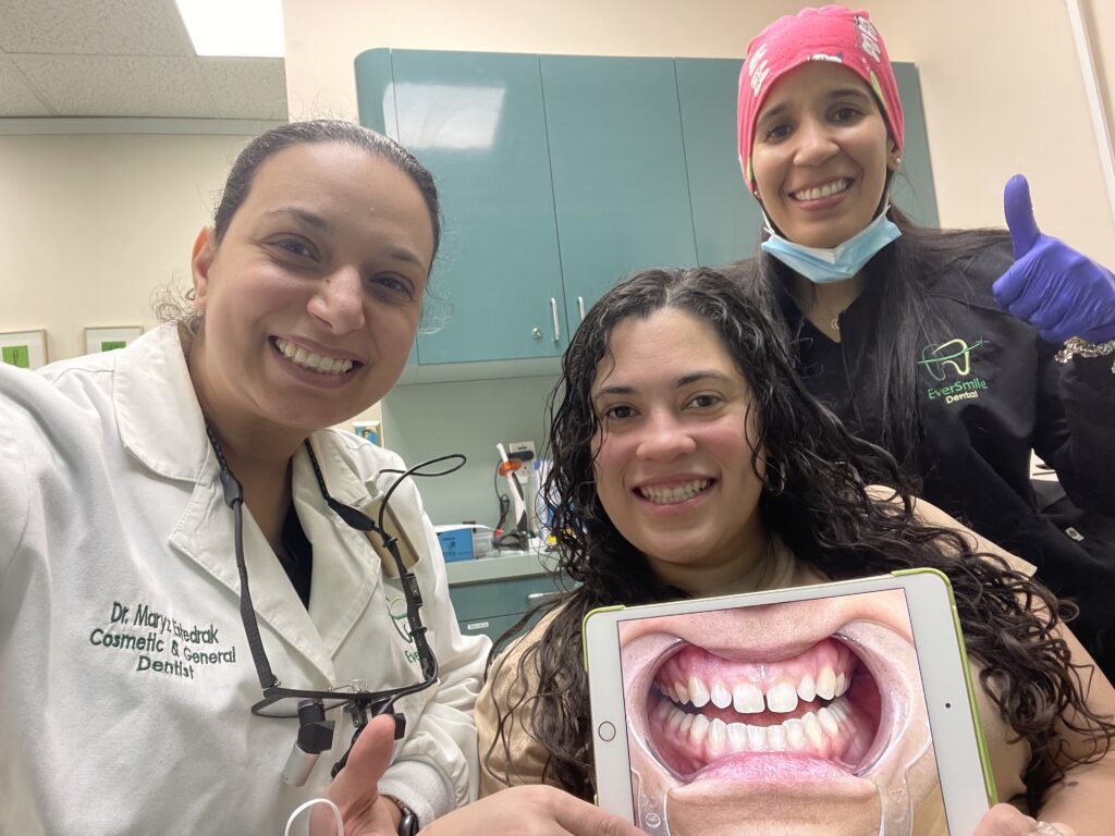 DR. MARYZ ESTEDRAK AND EVERSMILE DENTAL TEAM CELEBRATING PATIENT SMILE RESULTS - EVERSMILE DENTAL NJ