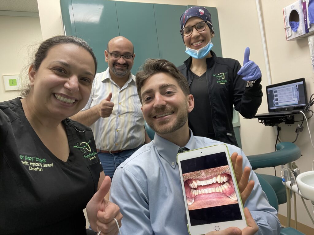 DR. MARYZ ESTEDRAK AND EVERSMILE DENTAL TEAM CELEBRATING PATIENT SMILE RESULTS - EVERSMILE DENTAL NJ