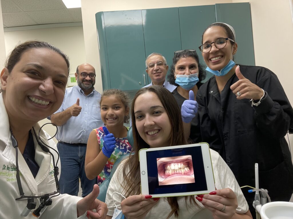 DR. MARYZ ESTEDRAK AND EVERSMILE DENTAL TEAM CELEBRATING PATIENT SMILE RESULTS - EVERSMILE DENTAL NJ
